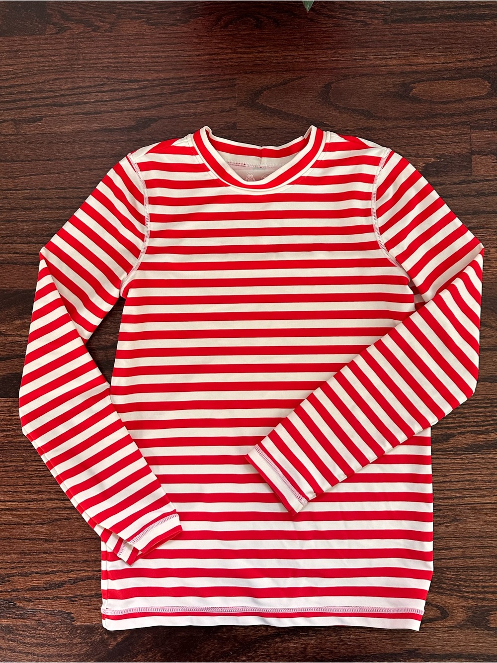 Primary long sleeve striped rash guard, size 8-9Y